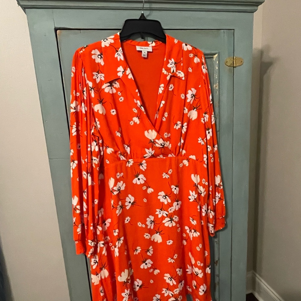 Bright Orange Soft-Collared Dress with White Floral Design